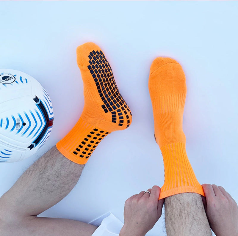 Meias Futebol
Antiderrapante Cano
Baixo - Laranja com
detalhes em preto